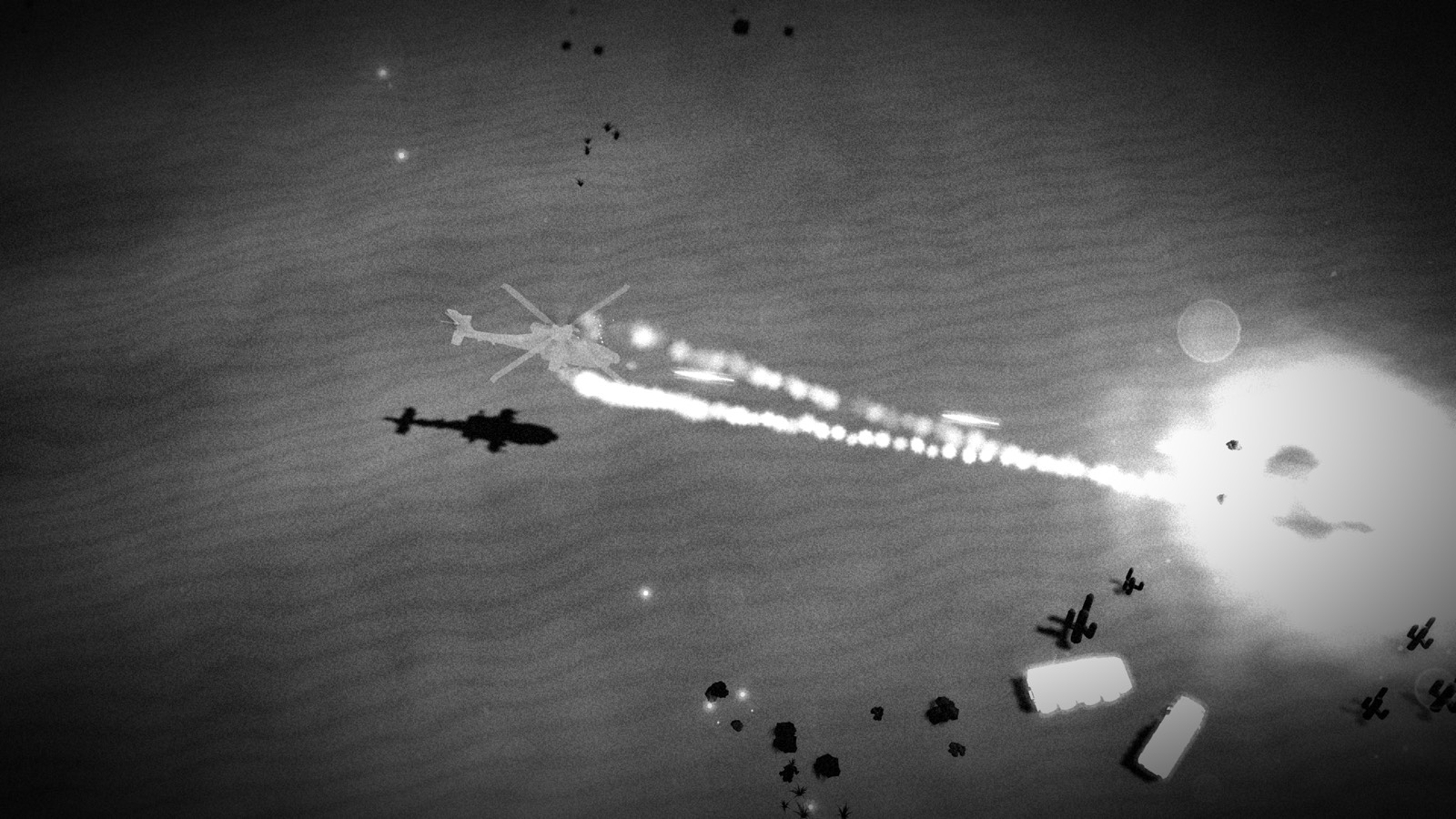 Thermal top-down: white-hot tracers from the Apache streaking into an explosion.