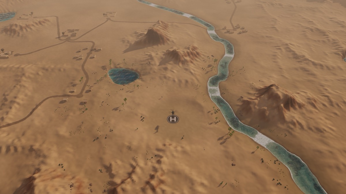 Range 205917 from above: a river along the edge of a sandy plain, a small lake and ridges, at dusk.